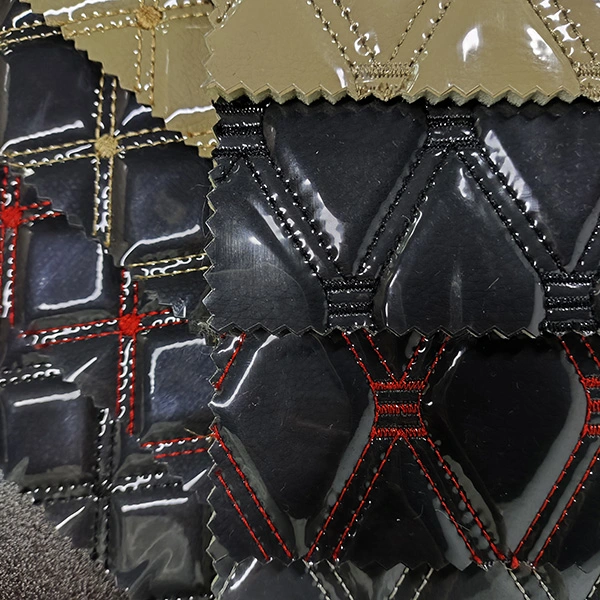 Stickereileder mit transparenter PVC-Folie